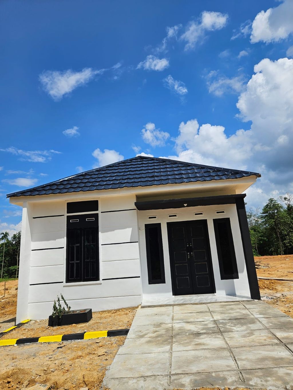 foto tampak rumah tipe 36 perumahan SR Villa & Resort