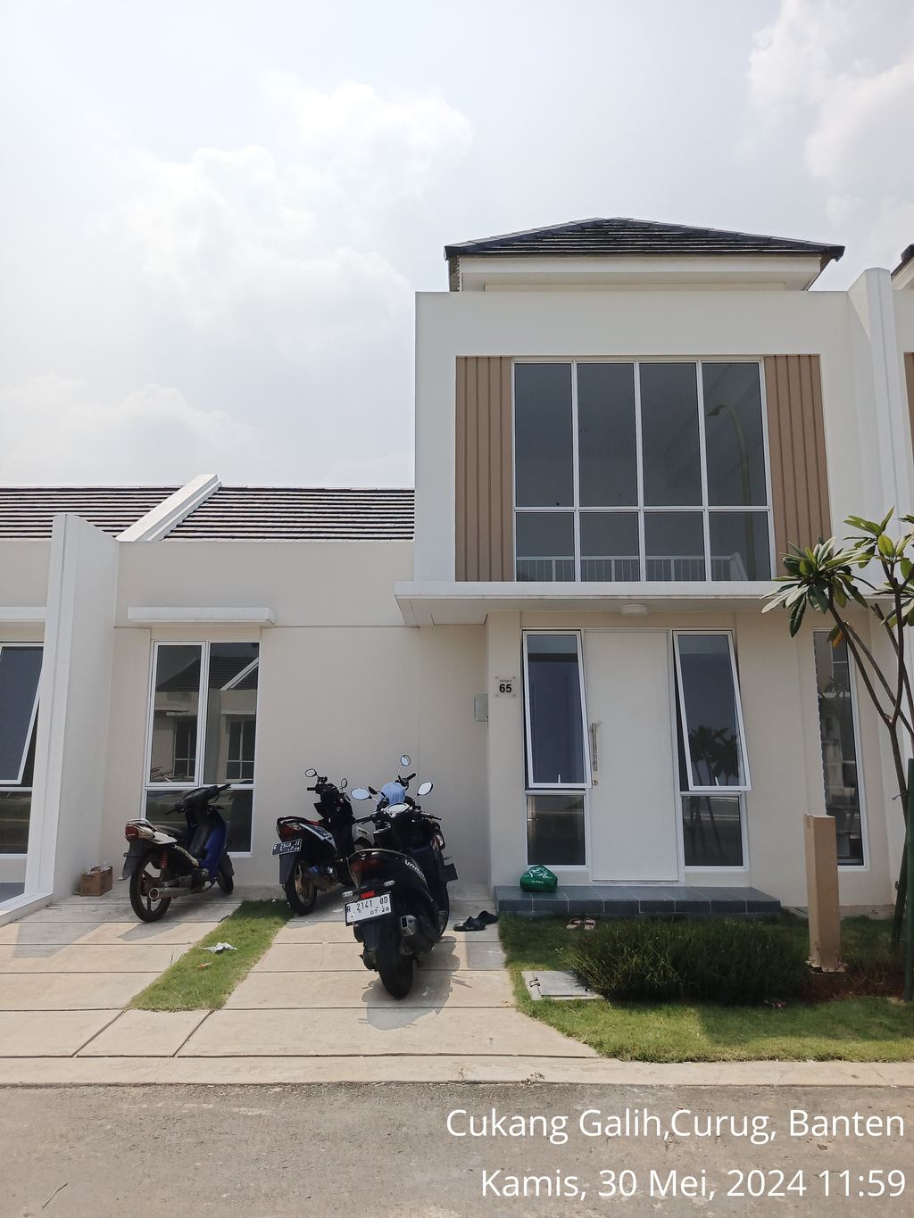 foto tampak rumah tipe ASTER 6/65 perumahan PARAMOUNT PETALS TAHAP 1