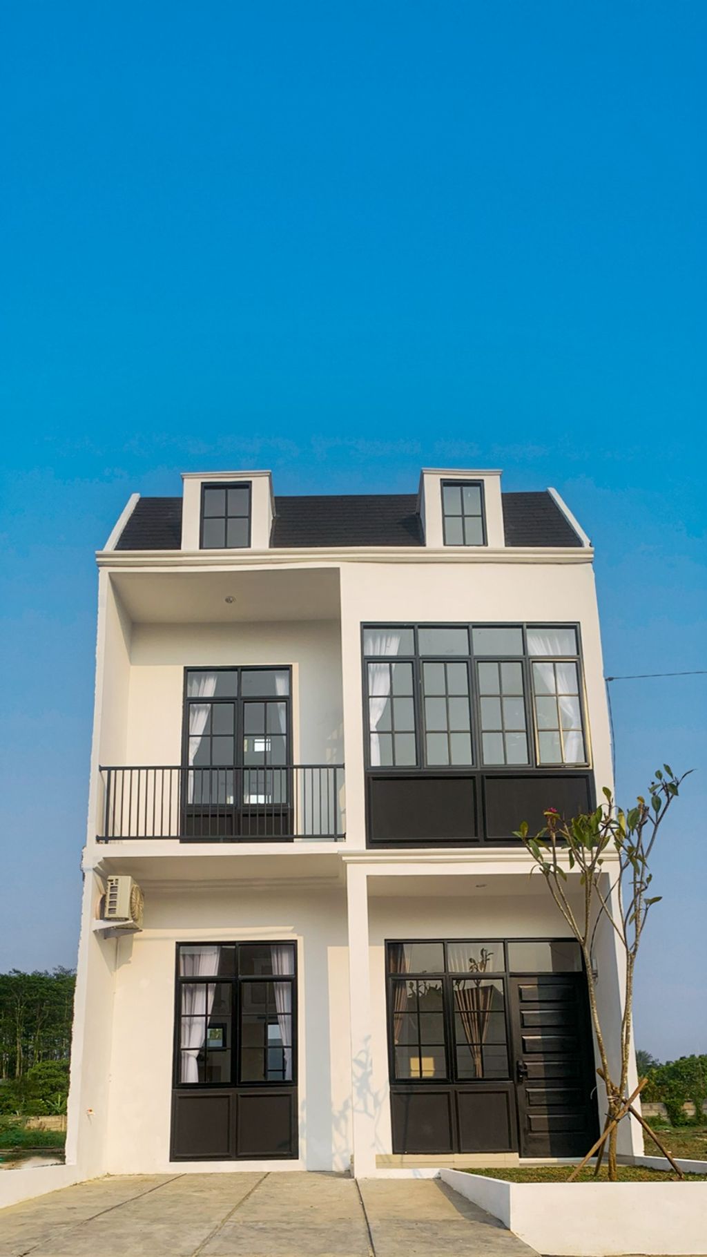 foto tampak rumah tipe Tulip 2 lt perumahan Green Paradise City Cluster Tulip
