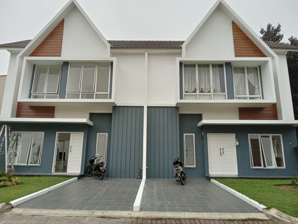 foto tampak rumah tipe BREDA K perumahan MEDAN RESORT CITY CLUSTER K