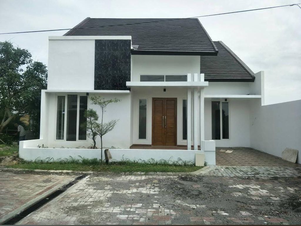 foto tampak rumah tipe 90/96 perumahan GRAND PANCA ARGA