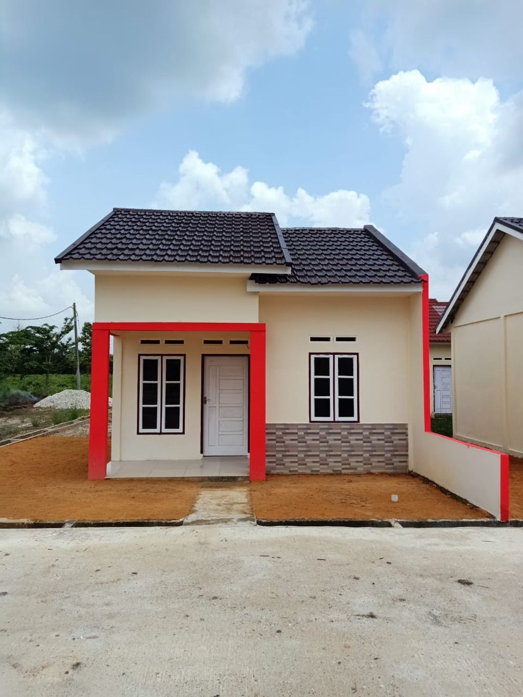 foto tampak rumah tipe RSH 36 perumahan RIZQY MULYA REGENCY 2