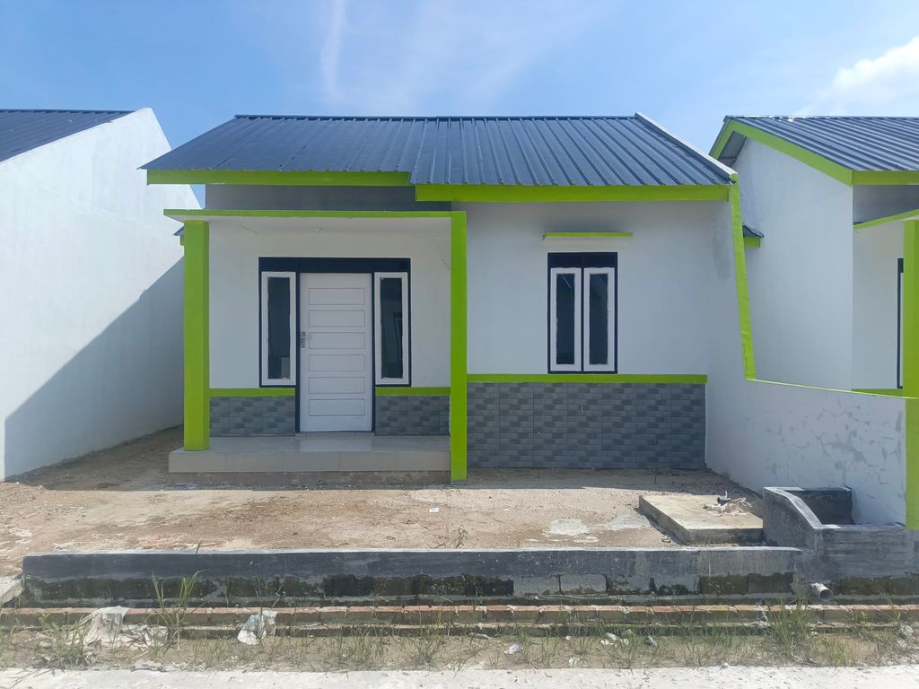 foto tampak rumah tipe 36 perumahan MUTIARA KARMILA 2 TAMBAHAN