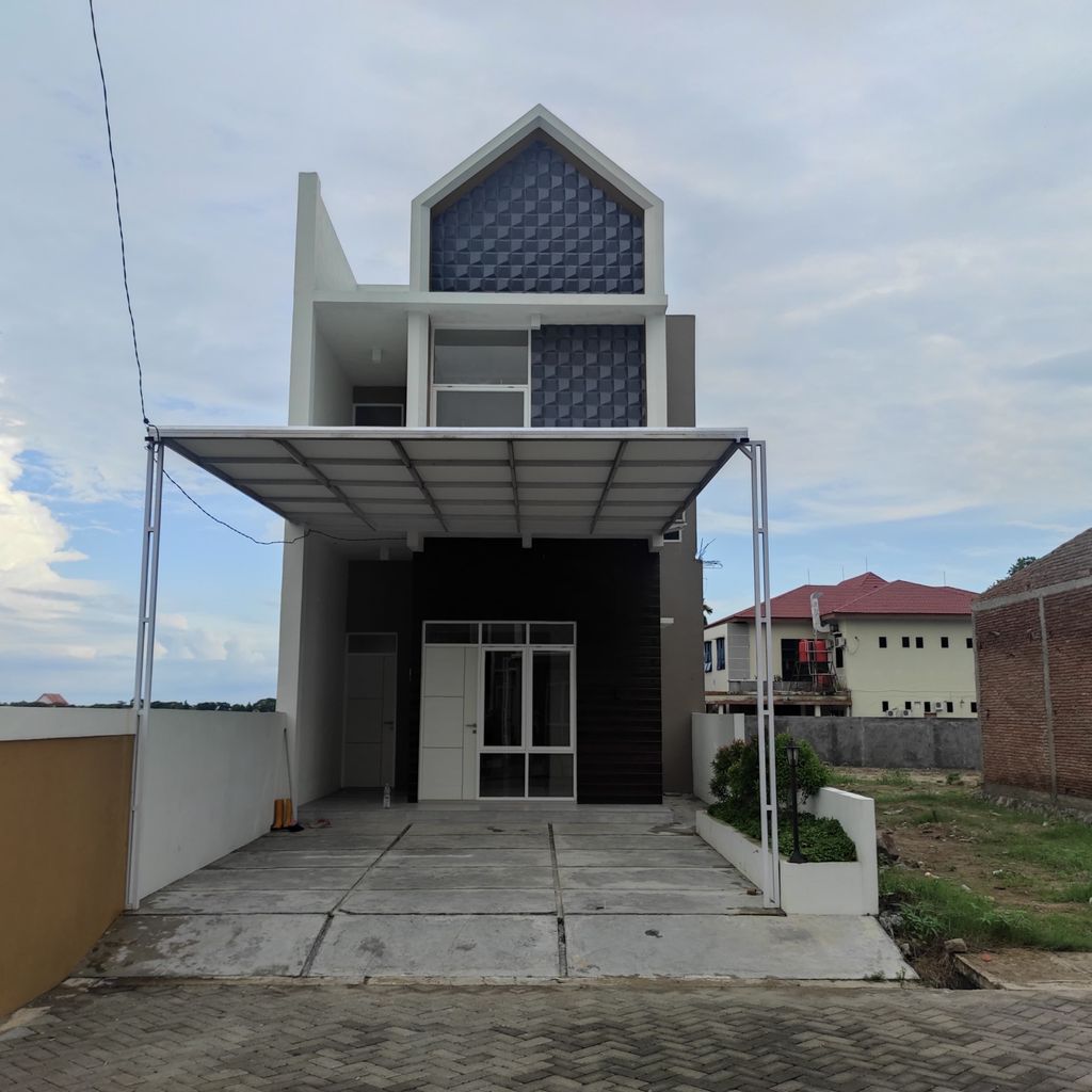 foto tampak rumah tipe 90 perumahan AL-IKHLAS TOWNHOUSE