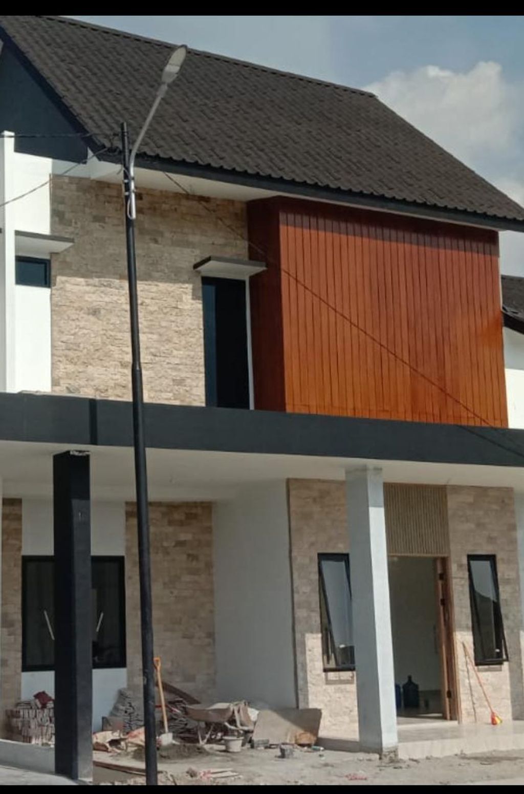 foto tampak rumah tipe CANOLA perumahan FLAMBOYAN PARK