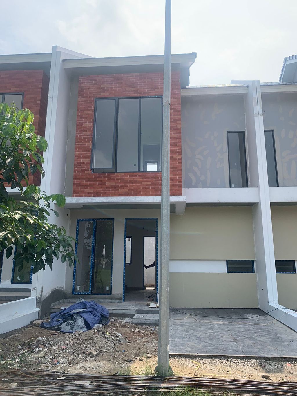 foto tampak rumah tipe MODERATTO perumahan THE SYMPHONY