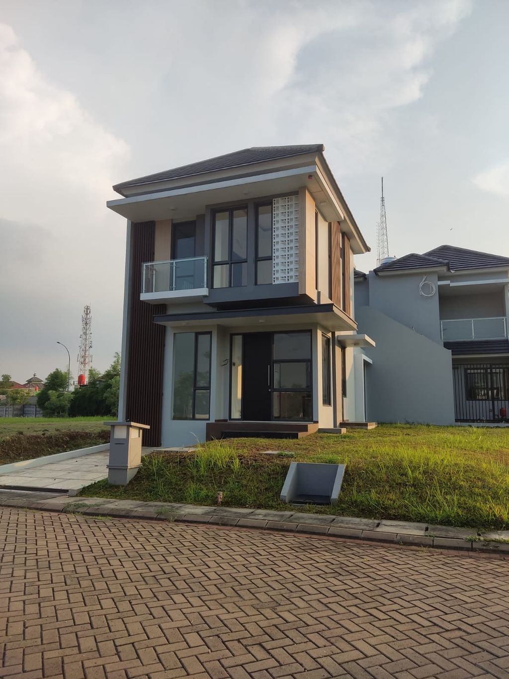 foto tampak rumah tipe BOUGENVILLE PLUS-D-11 perumahan Penta Garden