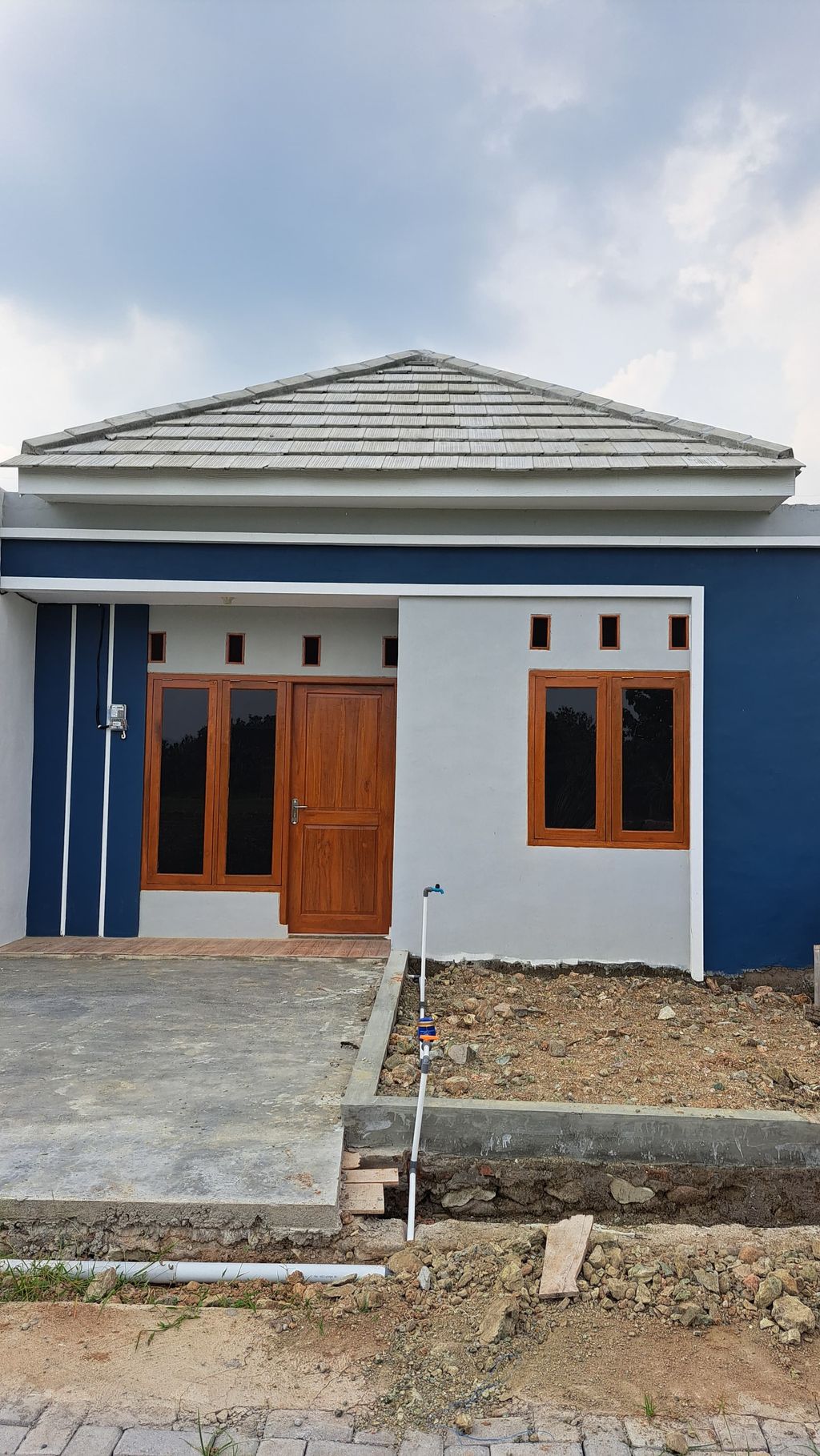 foto tampak rumah tipe 30 perumahan GRIYA MANDIRA VILLAGE 2