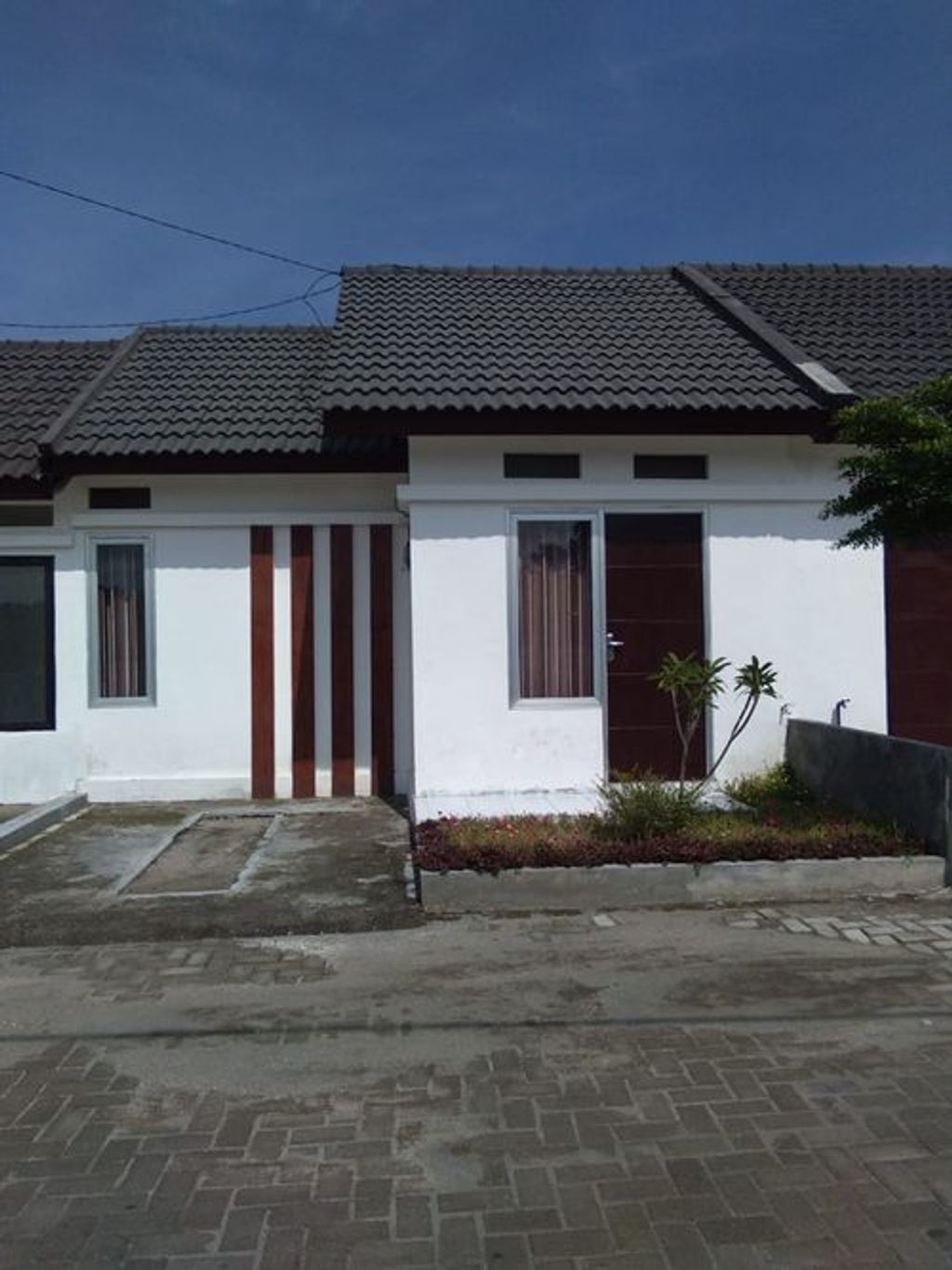 foto tampak rumah tipe 30/60 perumahan Pagu Hasanah Smart Living