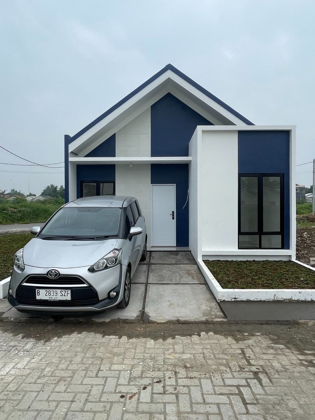 foto tampak rumah tipe RUBY EAST HOOK perumahan ARCADIA SOETTA SEPATAN
