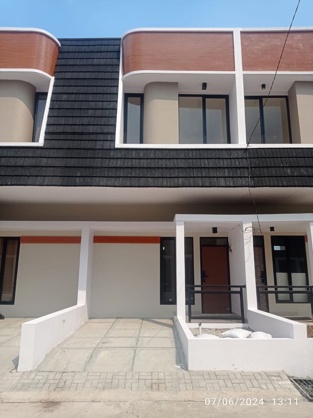 foto tampak rumah tipe 41 Compact (2 kamar) + Teras HC (518) perumahan G-Land Ciwastra Park 2