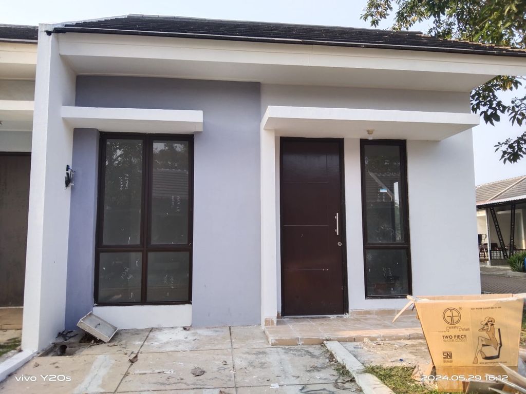 foto tampak rumah tipe HELICONIA SUDUT perumahan Puri Jaya 4