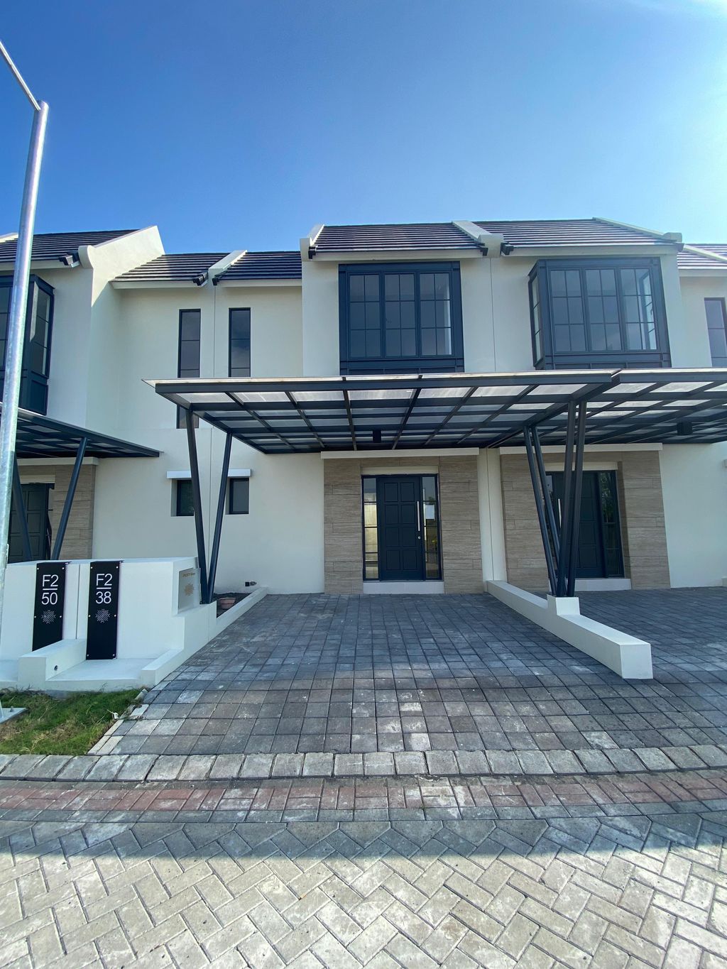 foto tampak rumah tipe CLUSTER PALAIS B F2-38 perumahan Opra City