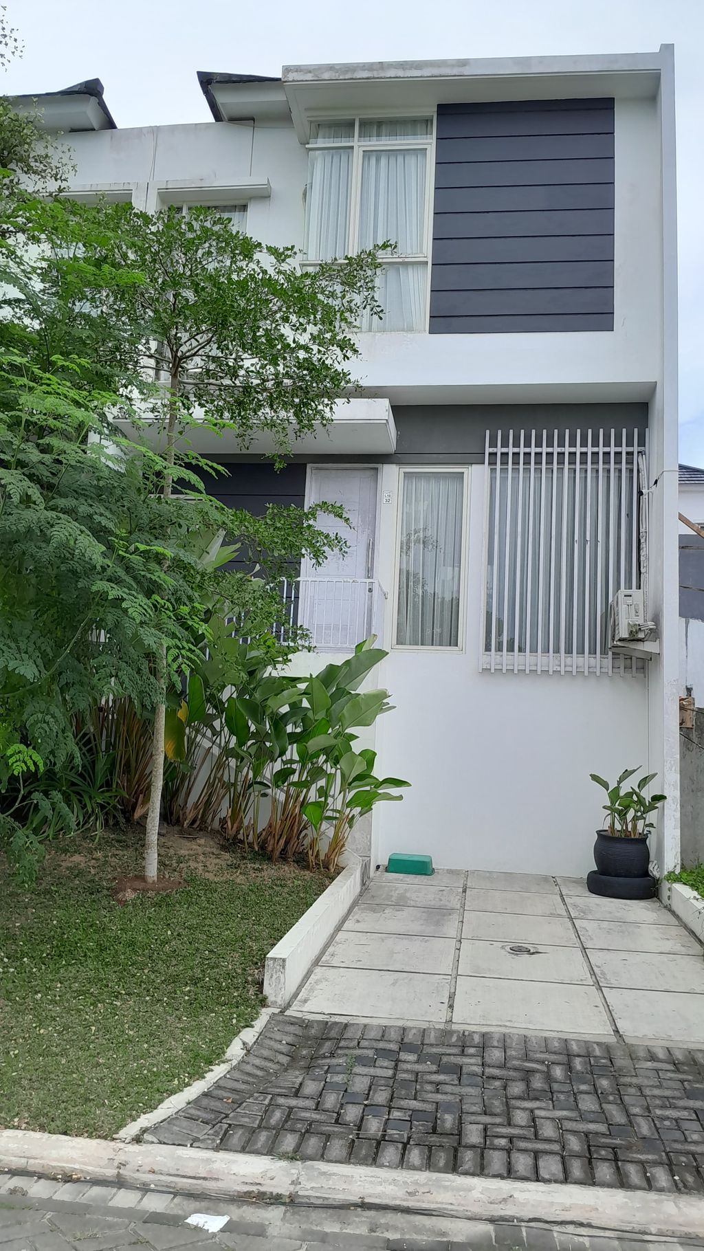 foto tampak rumah tipe Detail 61 Komersil III perumahan GRAND CITYBALIKPAPAN CLUSTER PINEVILLE