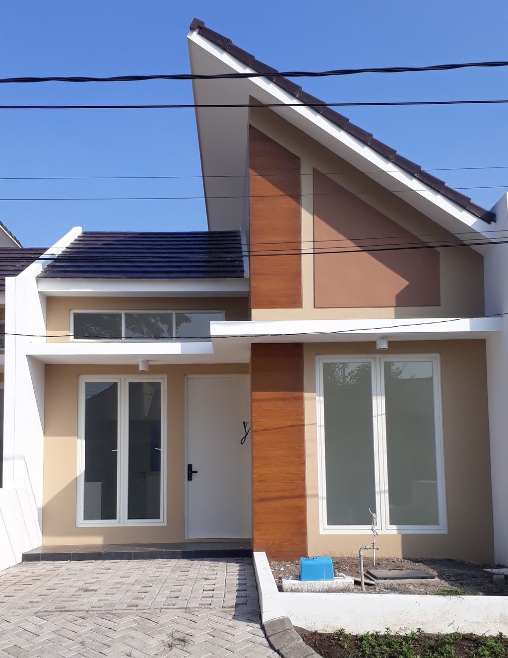 foto tampak rumah tipe Ademium 100 perumahan Banjar Mukti Residence