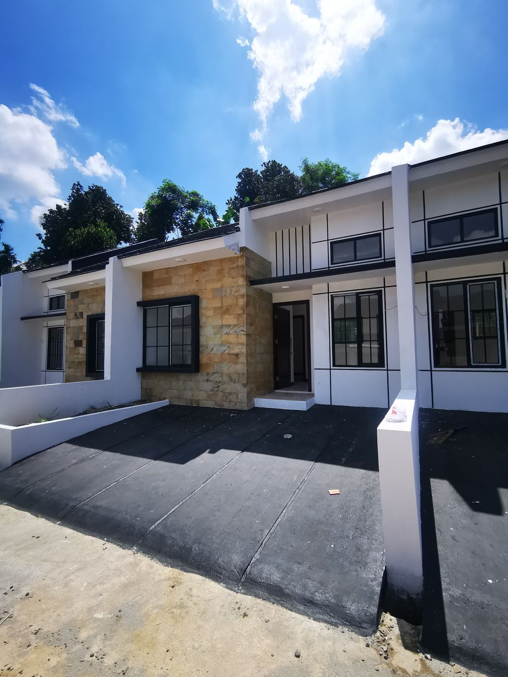 foto tampak rumah tipe 36/64 perumahan Grand Nadaa Residence