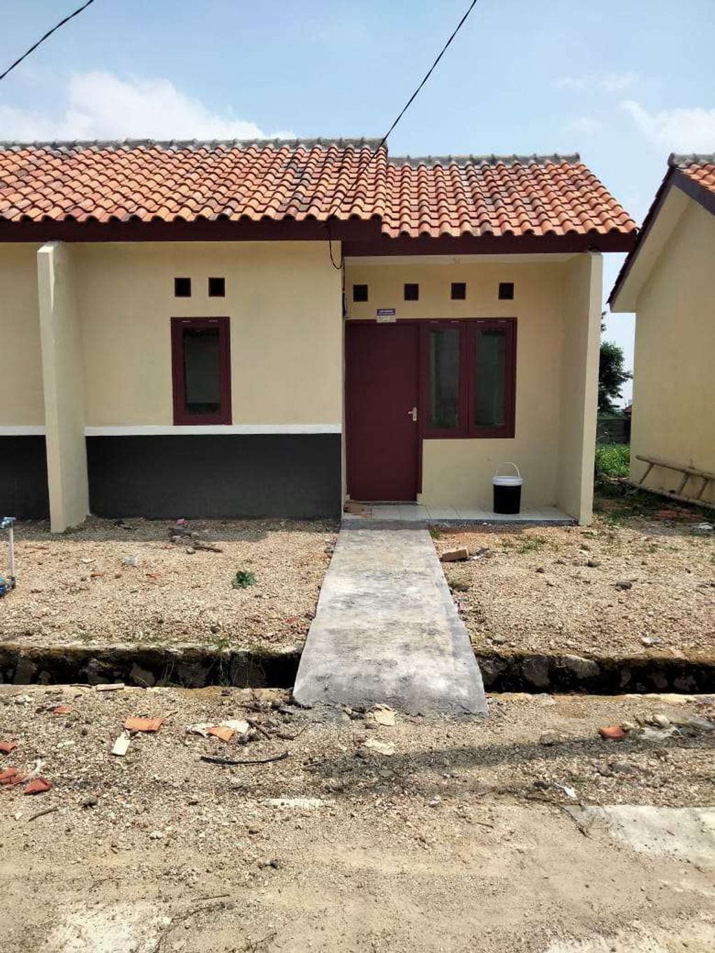 foto tampak rumah tipe 22 perumahan Tamansari Permai