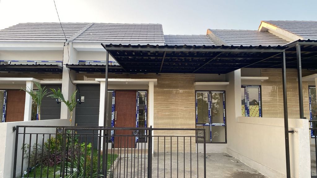 foto tampak rumah tipe NEW SEVILLA B perumahan PERUMAHAN GRAND KEDAMEAN REGENCY TAHAP III
