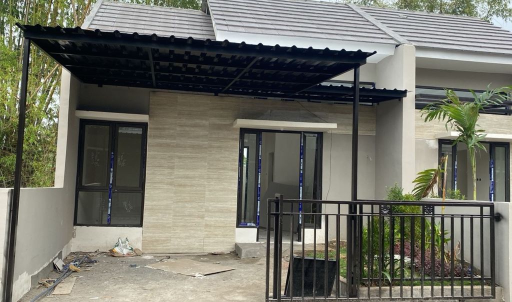 foto tampak rumah tipe BLOSSOM perumahan PERUMAHAN GRAND KEDAMEAN REGENCY TAHAP III