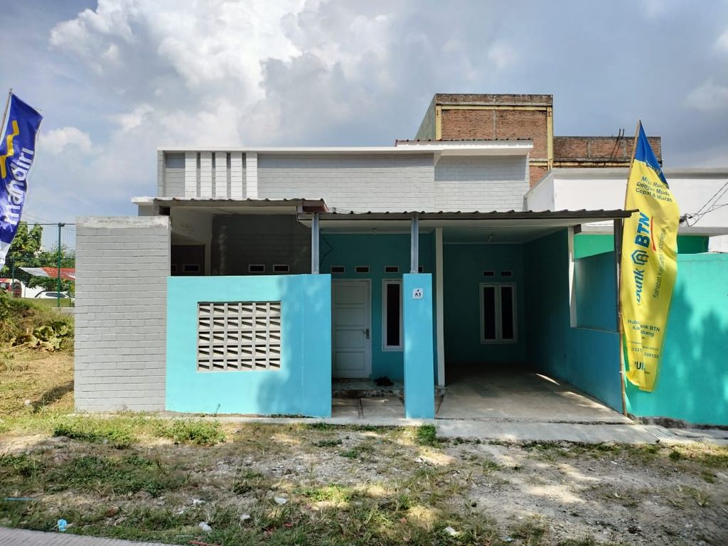 foto tampak rumah tipe 48/48 perumahan Artha Graha Surapandan