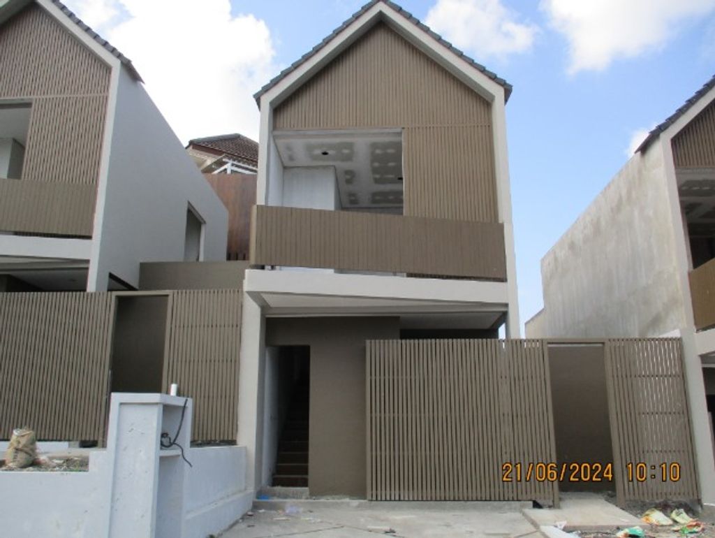 foto tampak rumah tipe Damita Signature perumahan DAMARA VILLAGE JIMBARAN HIJAU