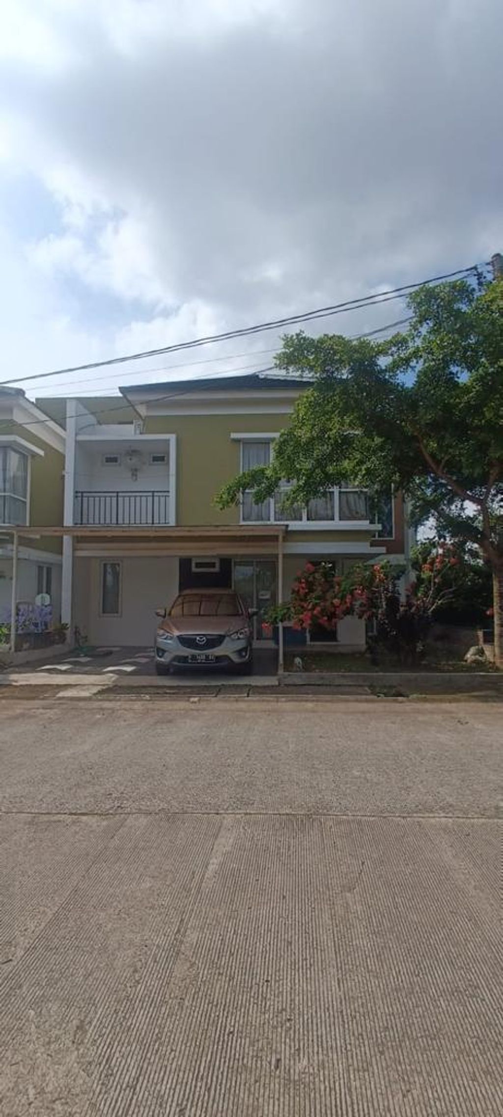 foto tampak rumah tipe Catalia perumahan Springhill Palembang