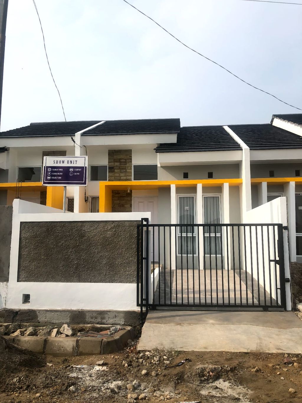 foto tampak rumah tipe NEW AKASIA B L.16-12 perumahan GRAND PESONA