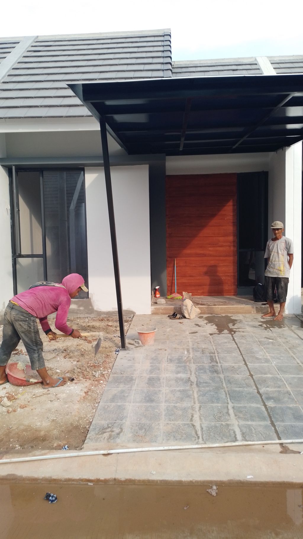 foto tampak rumah tipe FRESIA LITE 532 perumahan Mutiara Gading City Cluster New Liverpool Tahap 1