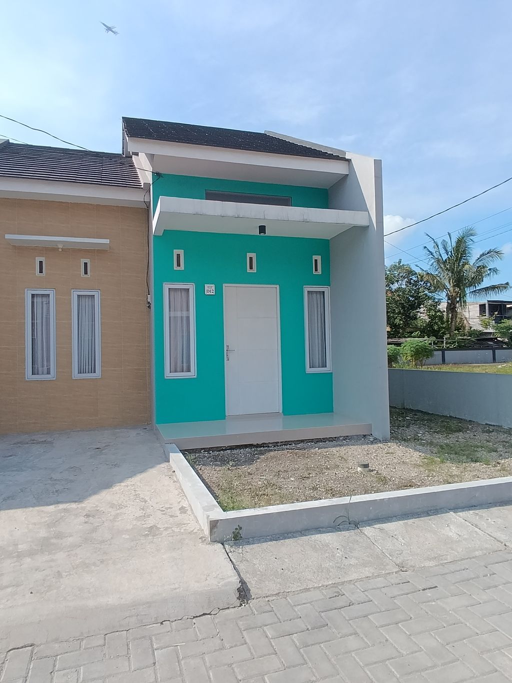 foto tampak rumah tipe 36/99 perumahan BTP RESIDENCE