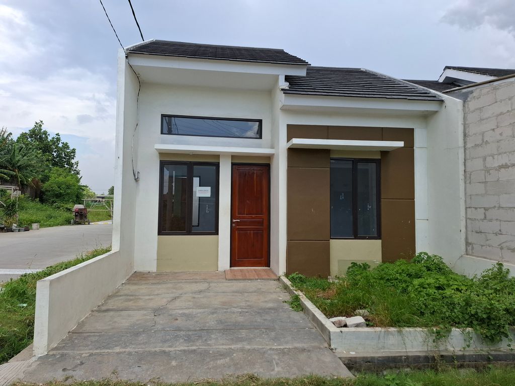 foto tampak rumah tipe Rose 2 perumahan Grand Bintang Mekarsari