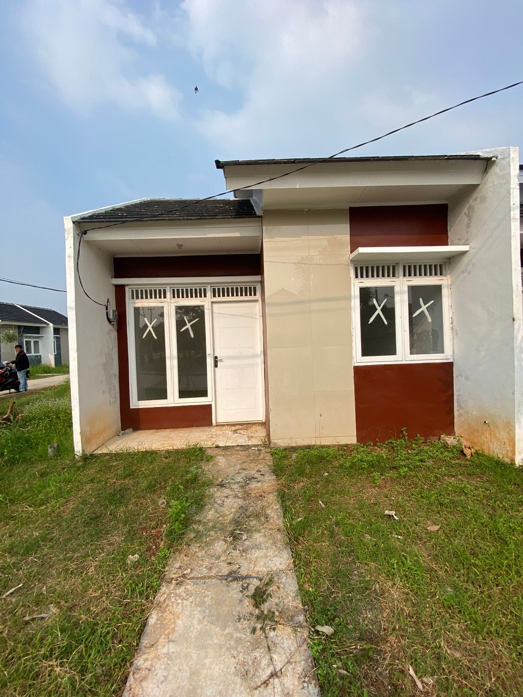 foto tampak rumah tipe 22/110 PPN perumahan Grand Tamansari 3 Residence