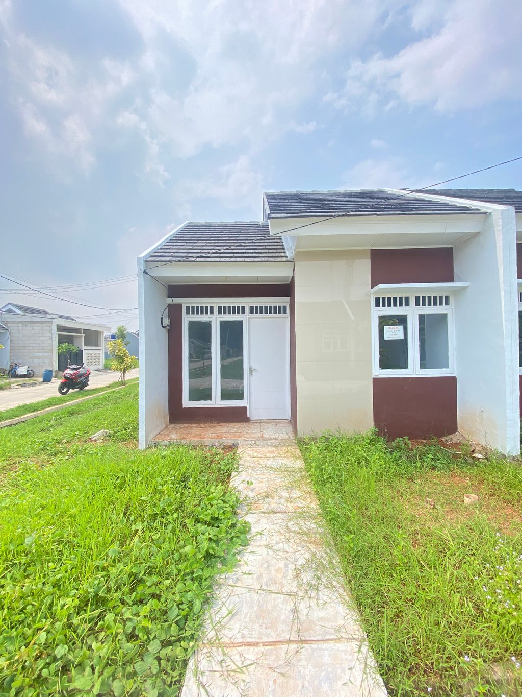 foto tampak rumah tipe 22/100 PPN perumahan Grand Tamansari 3 Residence