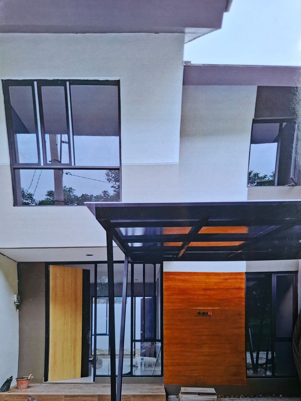 foto tampak rumah tipe BLUEBELL 1,289 perumahan Mutiara Gading City Cluster Okwood