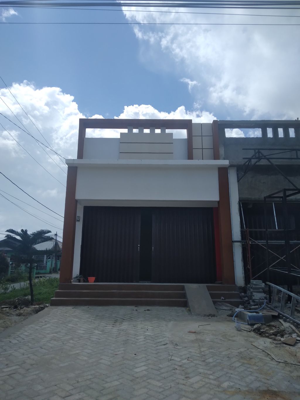 foto contoh rumah perumahan LASOANI BUSINESS CENTER