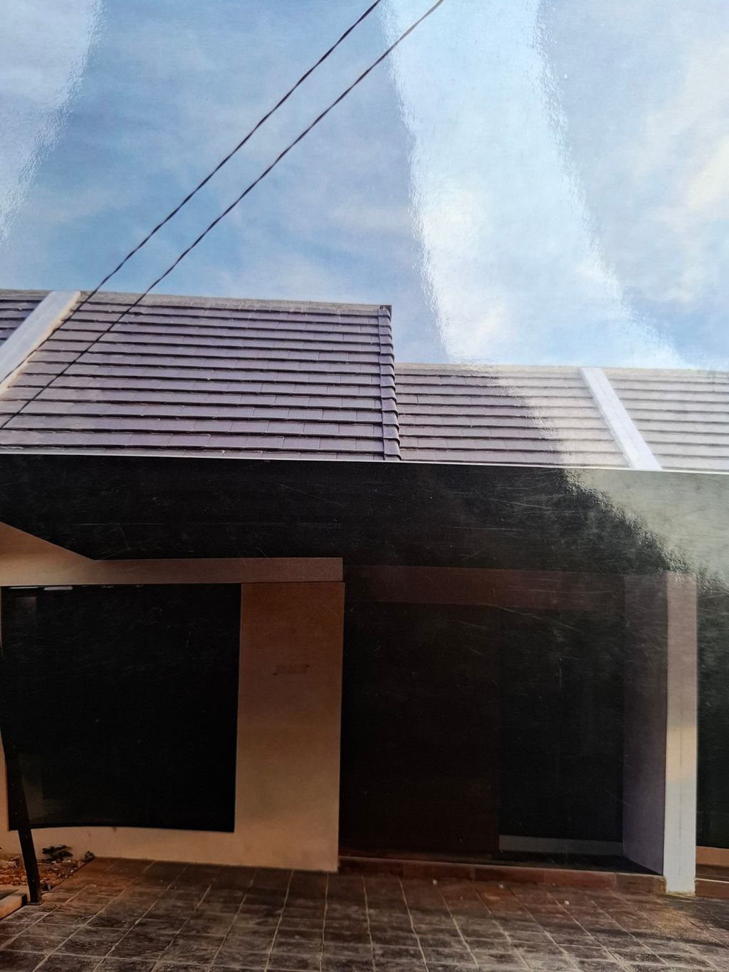 foto tampak rumah tipe PINATA 743 perumahan MUTIARA GADING CITY CLUSTER MONACO & PARIS