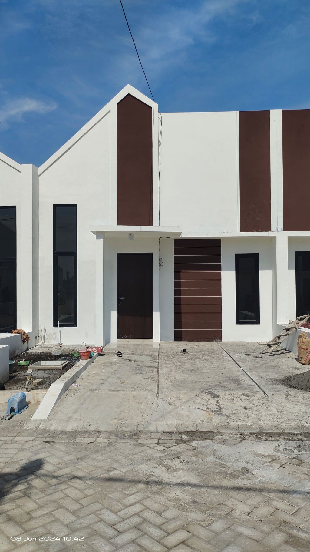 foto tampak rumah tipe THE WISE STANDAR 3 perumahan THE OSO 2
