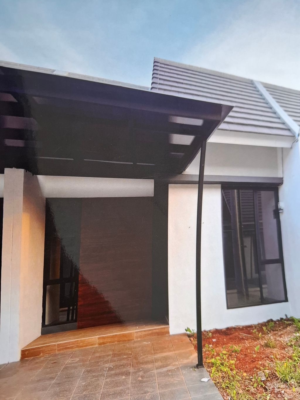 foto tampak rumah tipe FRESIA LITE 442 perumahan Mutiara Gading City Cluster New Liverpool Tahap 1