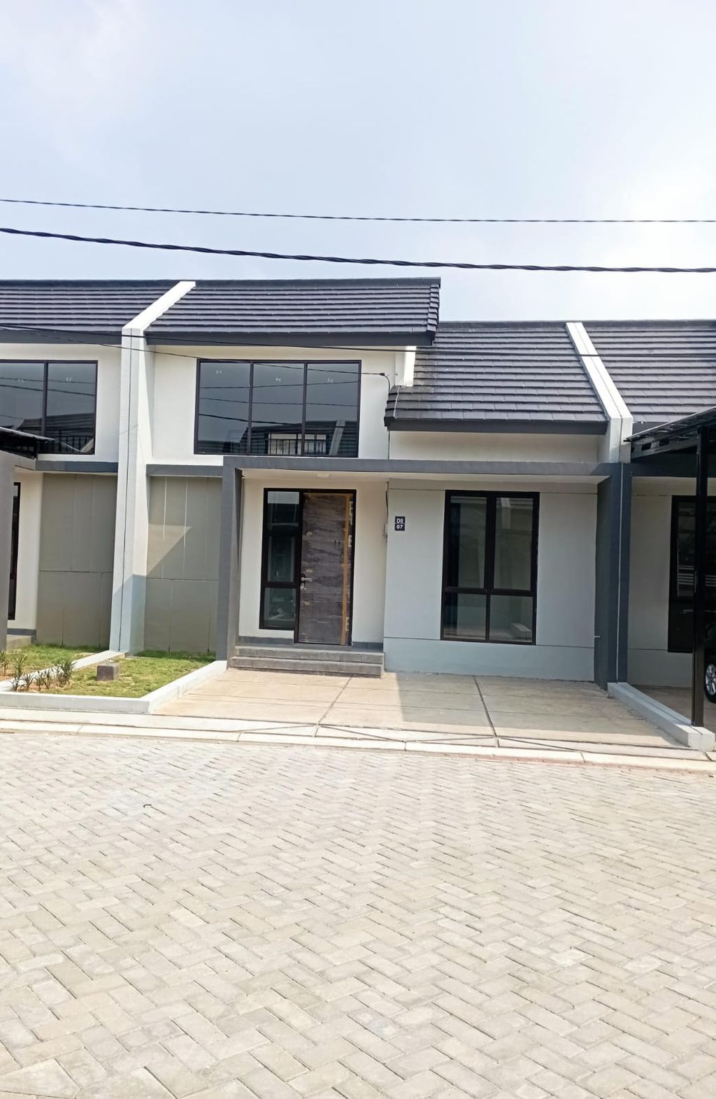 foto tampak rumah tipe 91/51 perumahan KSO PURI CEMPAKA