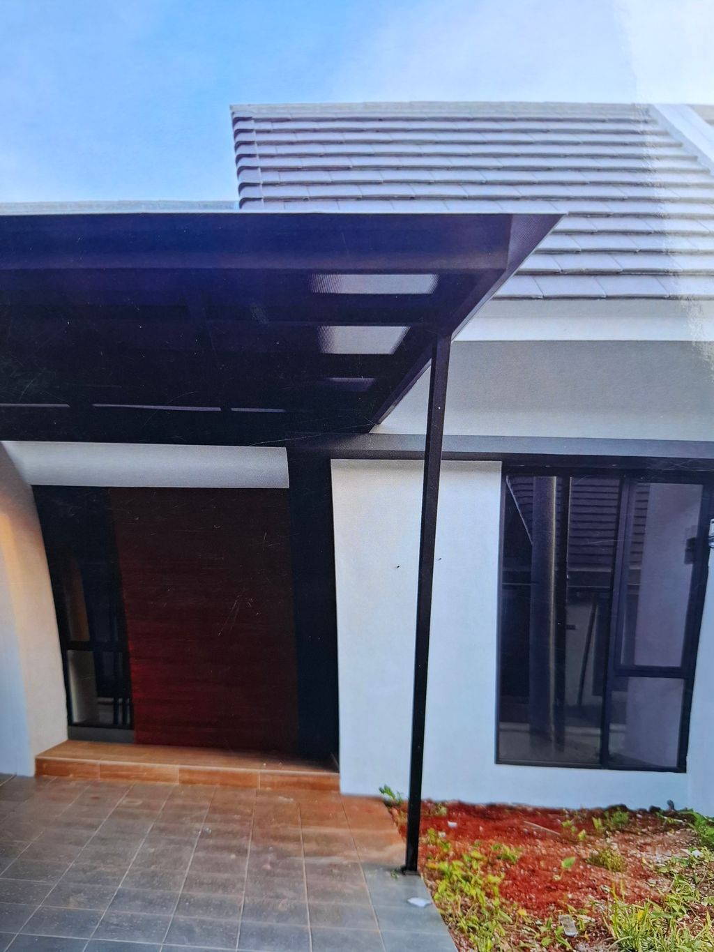 foto tampak rumah tipe FRESIA LITE 379,8 perumahan Mutiara Gading City Cluster New Liverpool Tahap 1