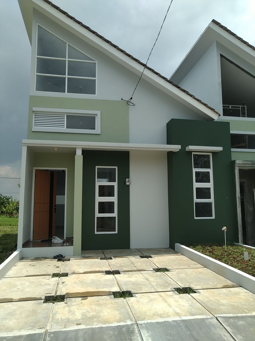 foto tampak rumah tipe Mezzanine 36/72 perumahan Bogor Alam Asri