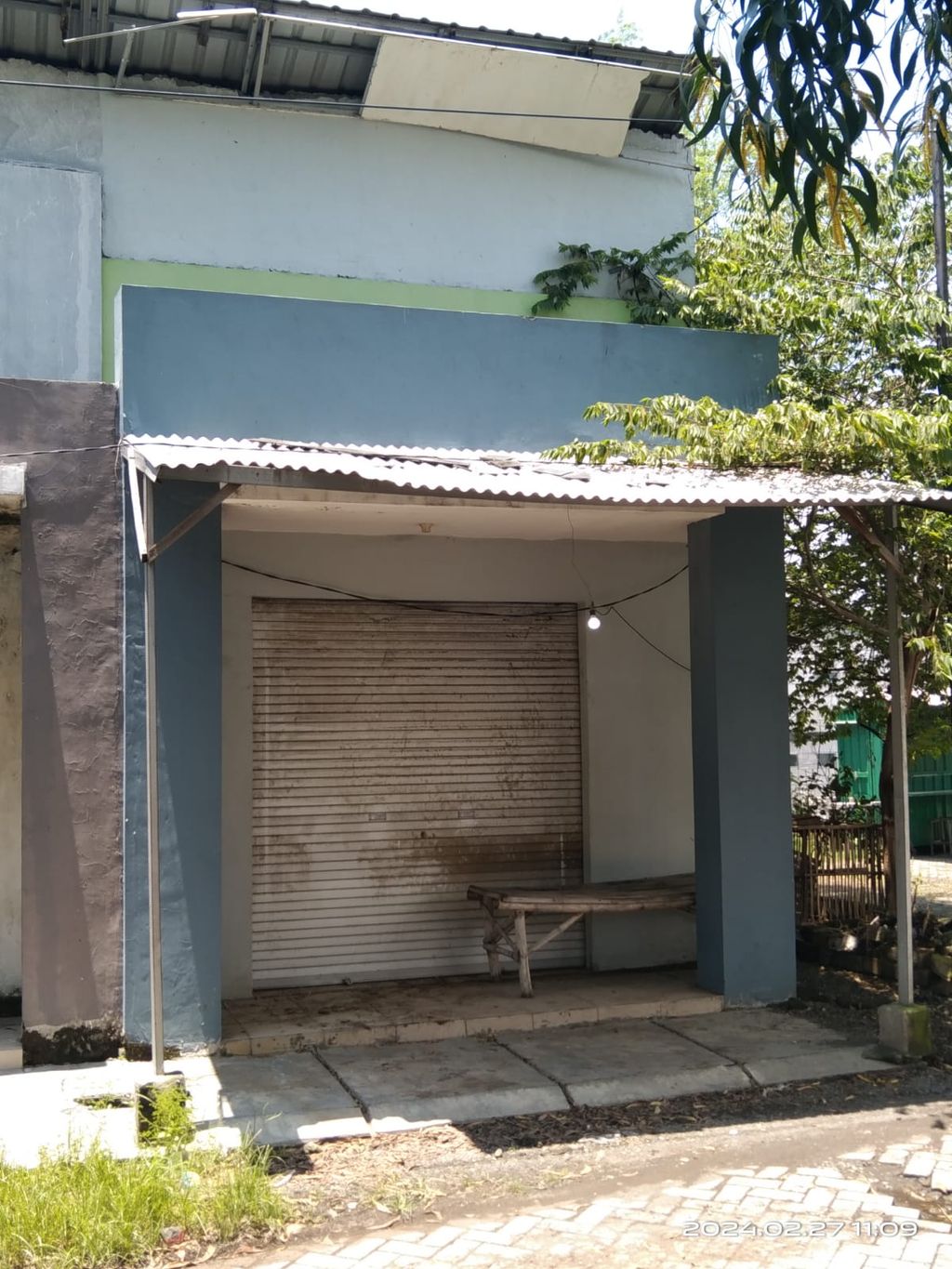 foto tampak rumah tipe MIKO PALM perumahan PESONA SARI RESIDENCE