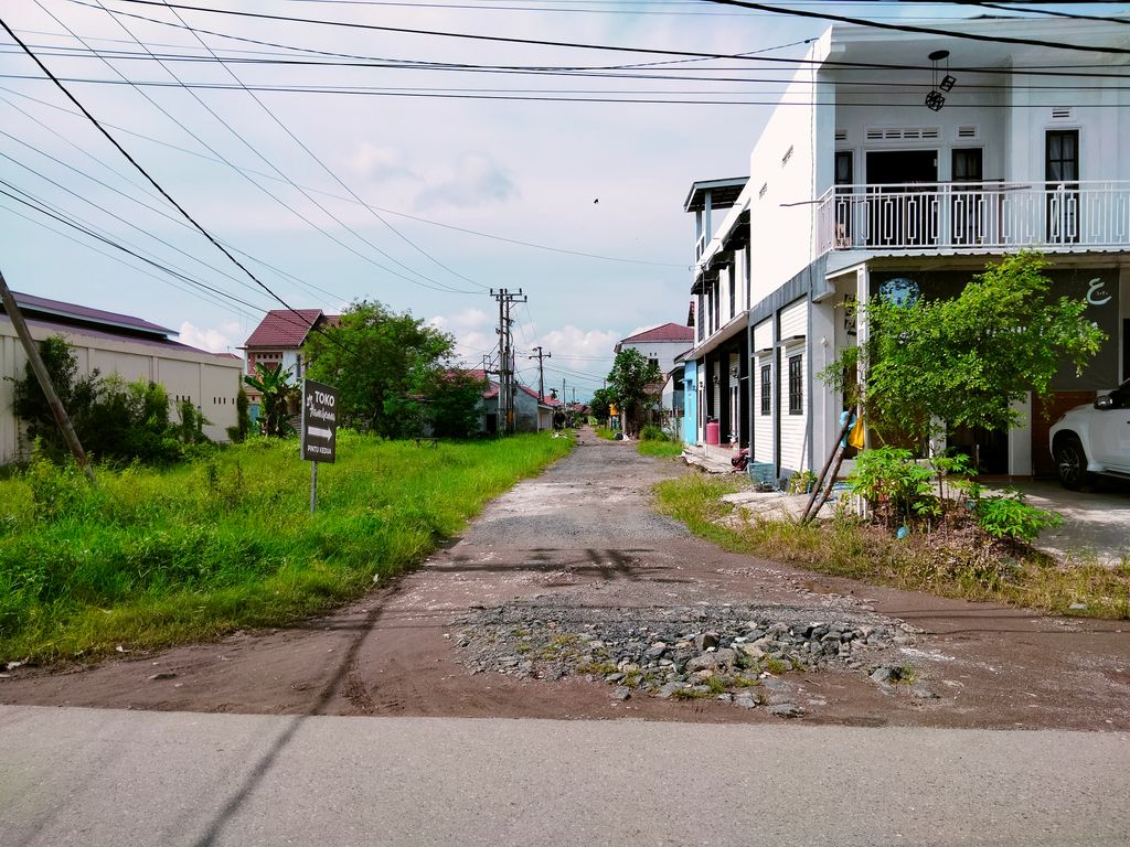 foto gerbang perumahan GRAHA TANJUNG REMA