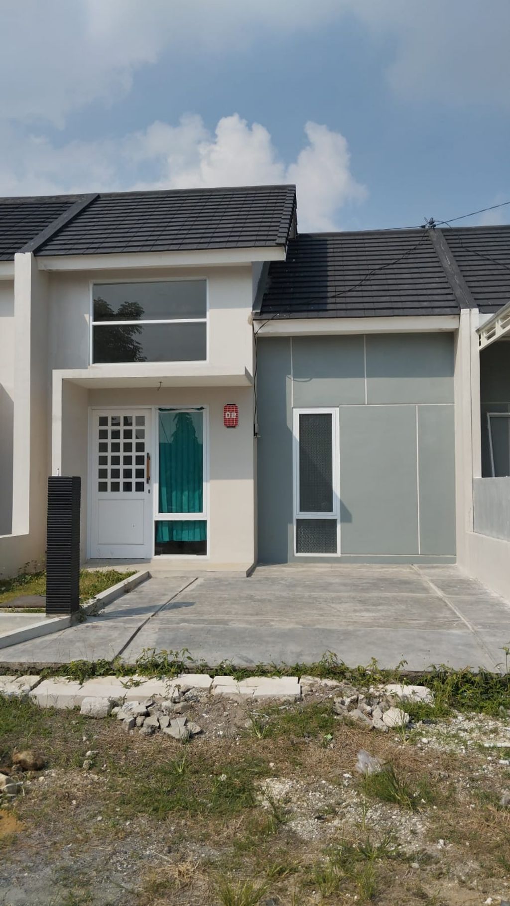 foto tampak rumah tipe SAKURA 36X66 perumahan MUARA GARDEN JAVANA