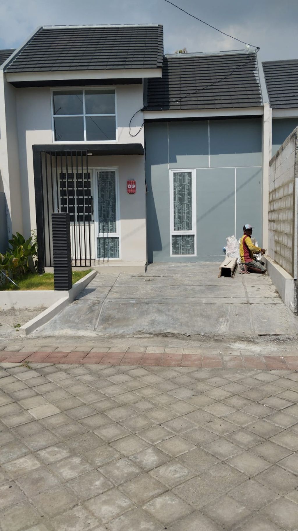 foto tampak rumah tipe SAKURA 36X68 perumahan MUARA GARDEN JAVANA