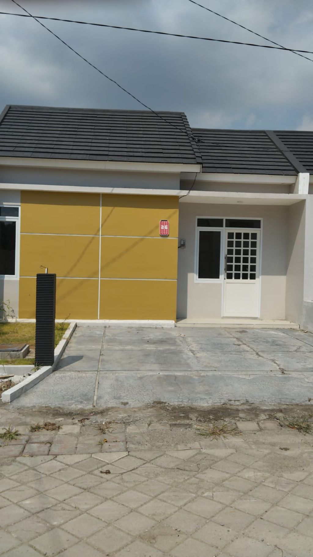 foto tampak rumah tipe KIMURA PLUS 30X70 perumahan MUARA GARDEN JAVANA