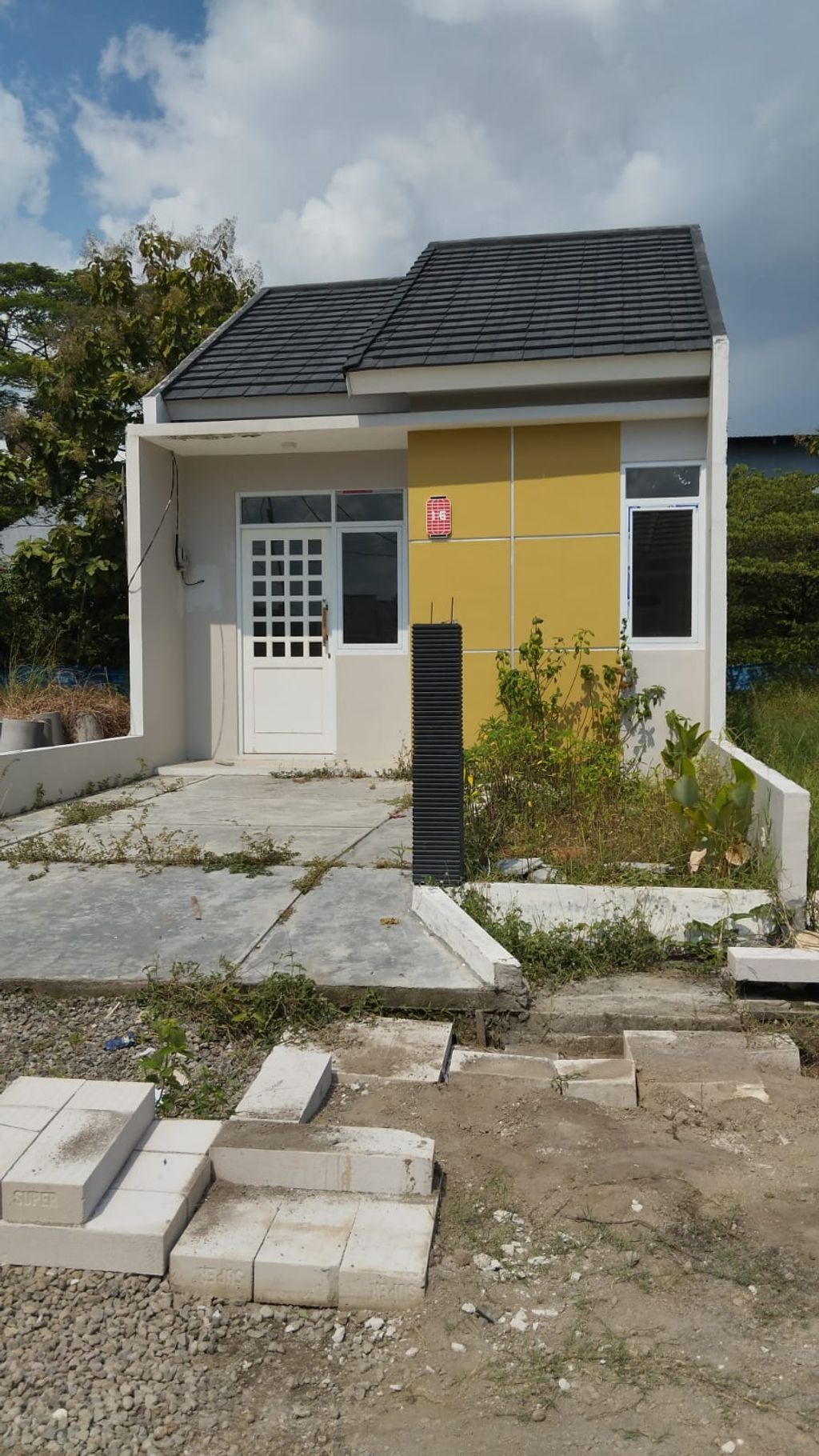 foto tampak rumah tipe KIMURA PLUS 30X86 perumahan MUARA GARDEN JAVANA