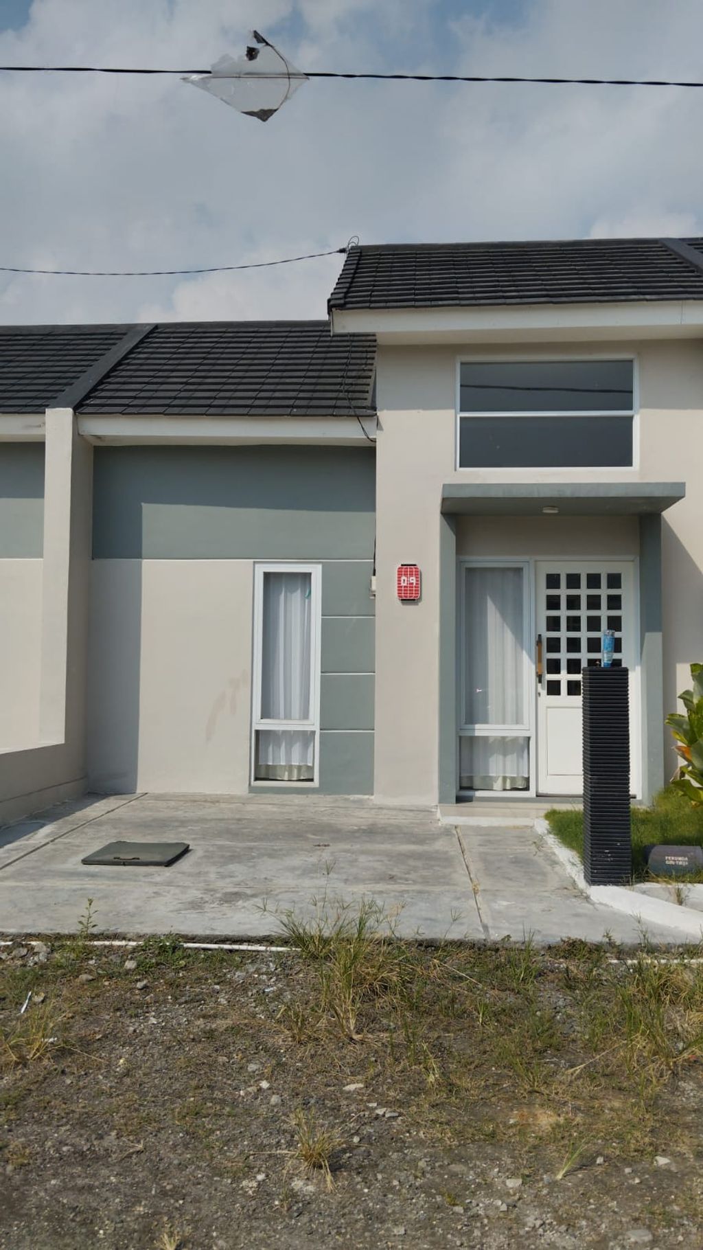 foto tampak rumah tipe HARUKA L 30 X60 perumahan MUARA GARDEN JAVANA