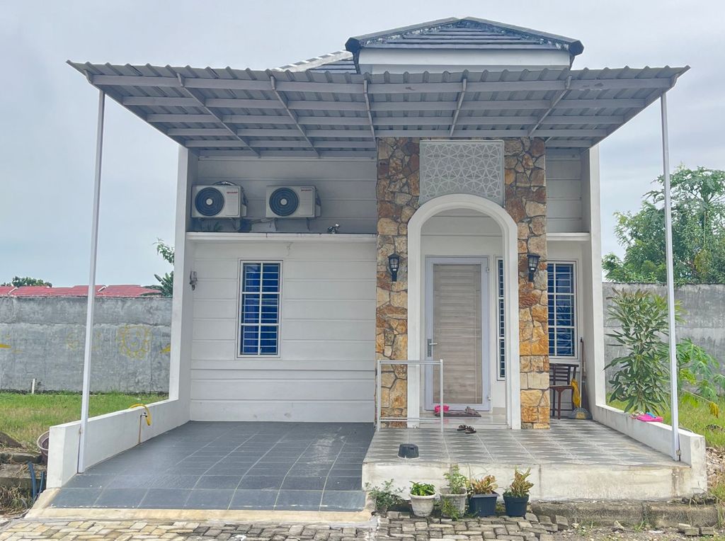 foto tampak rumah tipe Gloxinia perumahan Taman Asoka Asri Cluster Delonix