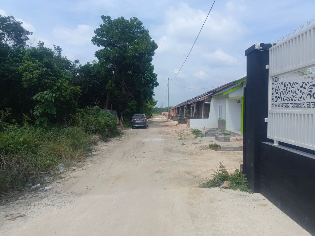 foto gerbang perumahan MUTIARA KARMILA 6