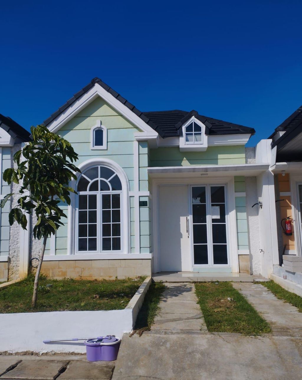 foto tampak rumah tipe 42/84 perumahan BRITANIA BEKASI (TAHAP 2)